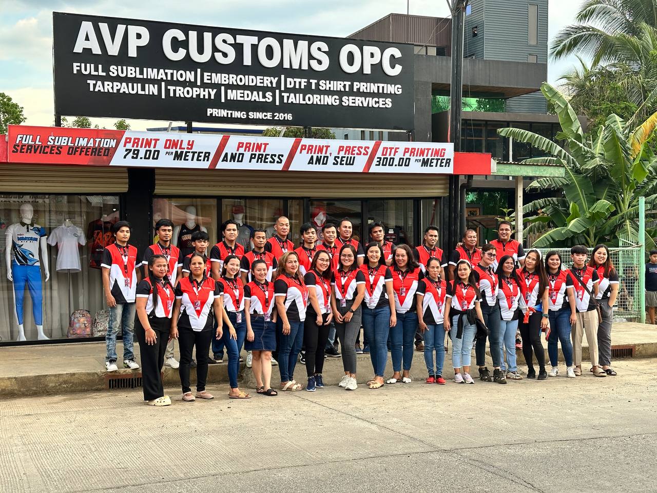 Staff working on custom apparel orders at AVP Custom Prints